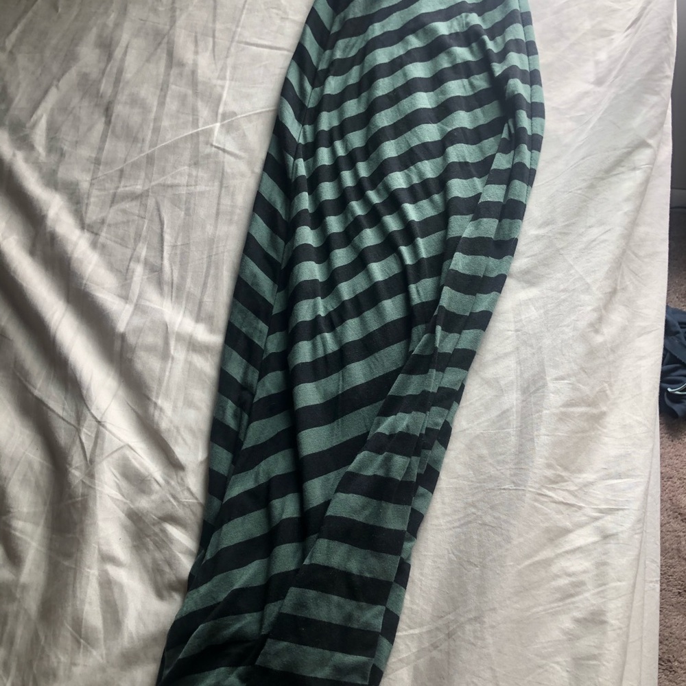 Green and black floor length skirt.